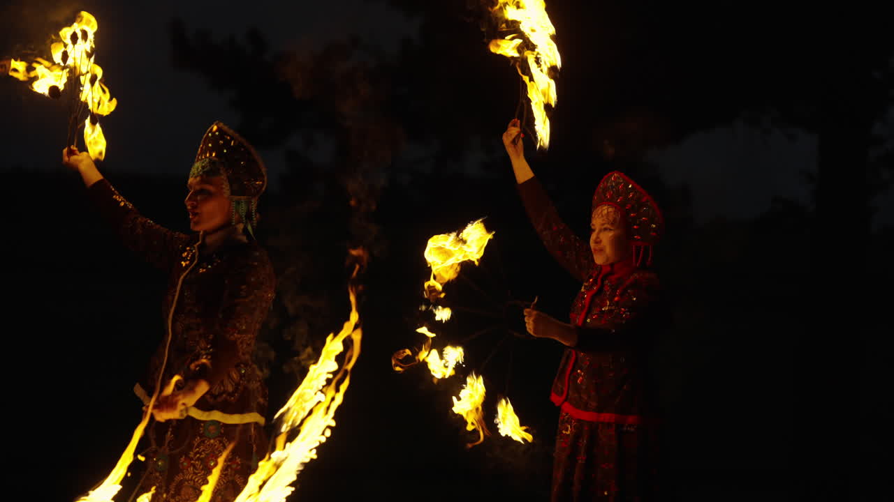 Fire Dancers in Traditional Costumes