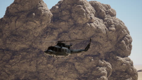 military helicopter flying over the desert