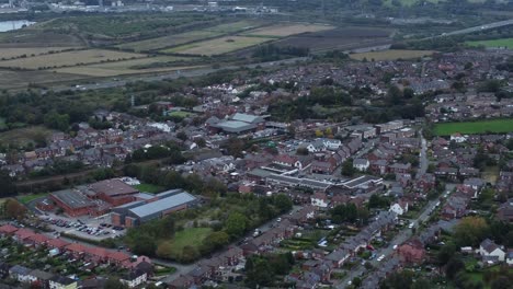 Aerial-view-above-Halton-North-England-Runcorn-Cheshire-countryside-industry-landscape-pan-up-right