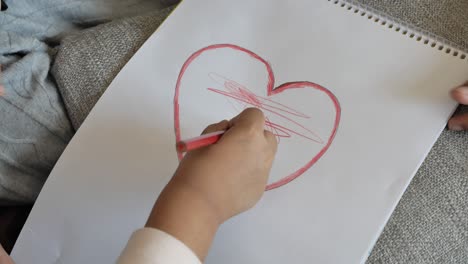 children drawing a heart