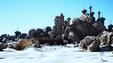 un gran edificio de piedra con muchas torres en la parte superior