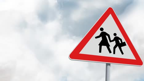 Pedestrian-crossing-sign-board-post-against-clouds-in-the-blue-sky