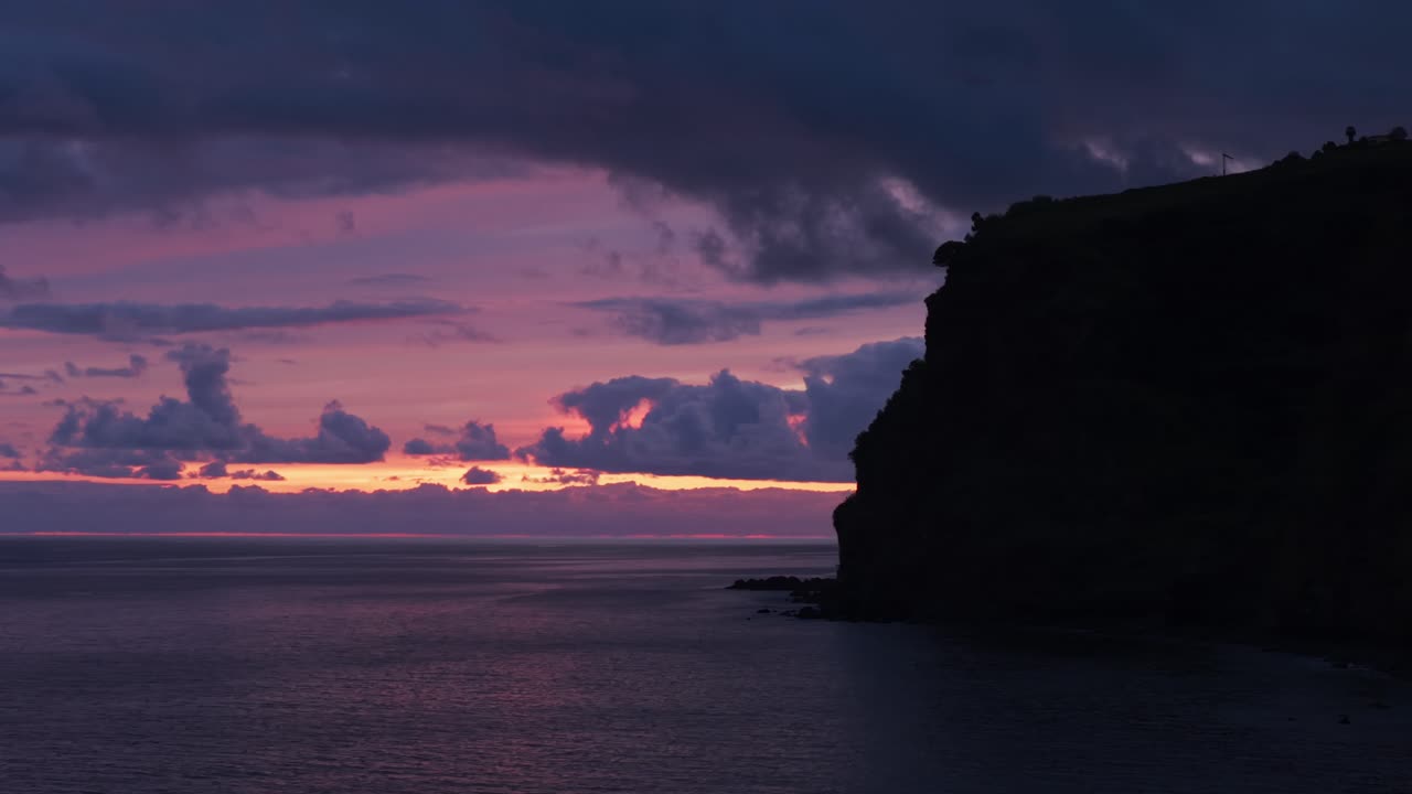 Dramatic Sky Over The Sea During Sunset In Calheta, Madeira, Portugal. - aerial shot