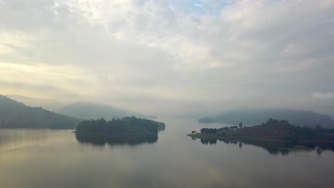 Misty-Landscape-Of-Lake-Bunyonyi-In-Uganda---aerial-shot