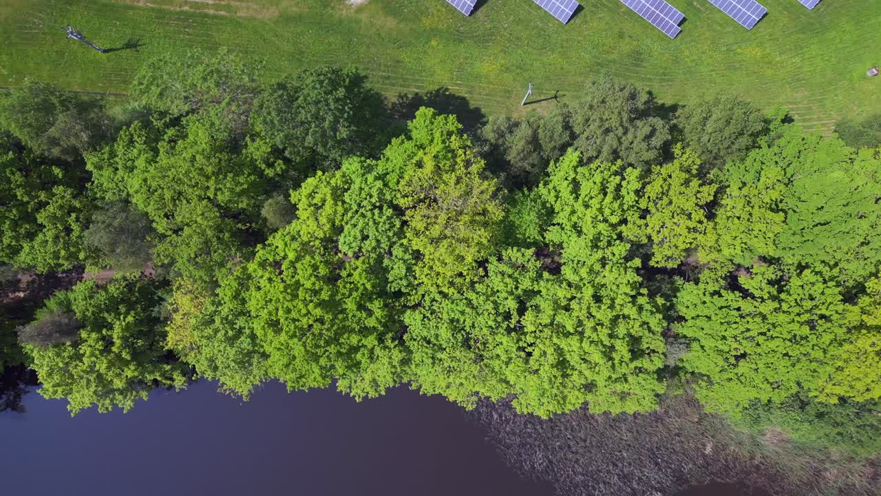 Gorgeous aerial top view flight Solar field plant factory at village Chlum, Czech Republic Summer 2023