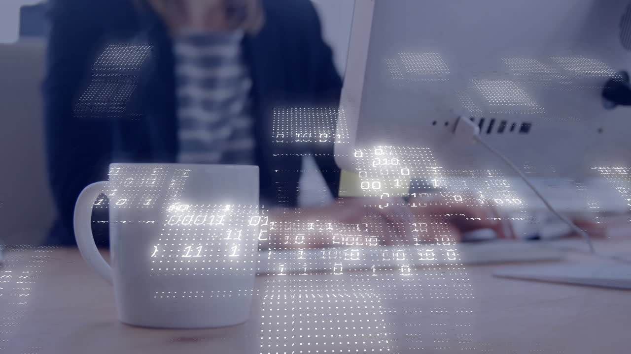 Female office worker typing on keyboard near coffee mug, showcasing technology binary code overlays