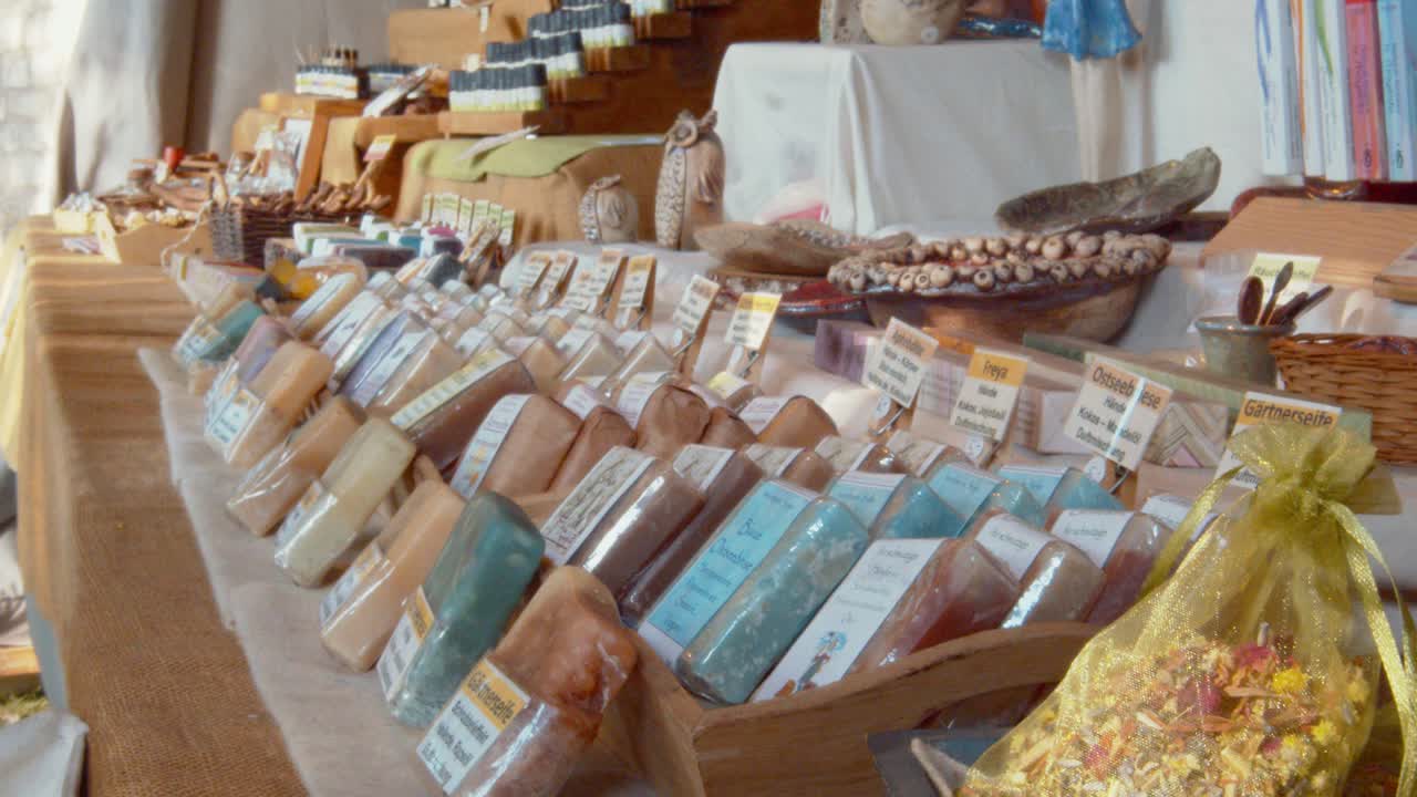 A scent-selling stand on a medieval market