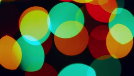 circular bokeh christmas sparkles lights abstract background.