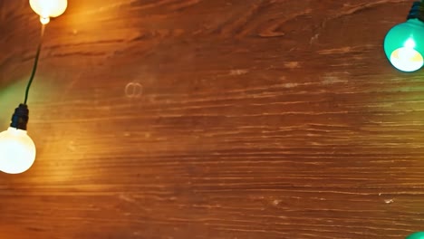 warm string lights on wooden wall