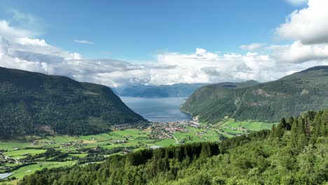 aerial revealing stunning panoramic view of vik in sogn - summertime norway seen from storesvingen viewpoint