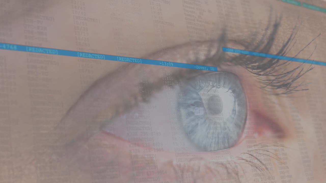 Animation of woman's blue eye with blue lines moving scanning over it