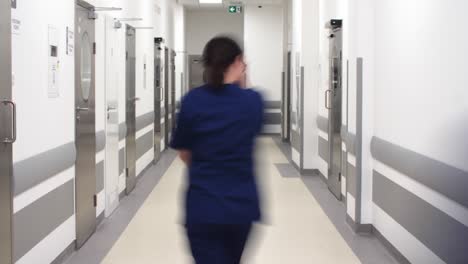 time lapse video of busy doctors on the corridor