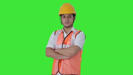 Portrait-of-Confident-Indian-architect-standing-crossed-hands-Green-screen