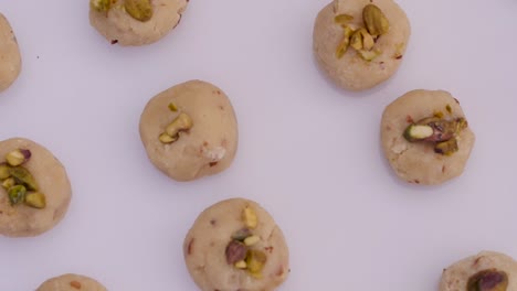 pistachio pastries on a white platter