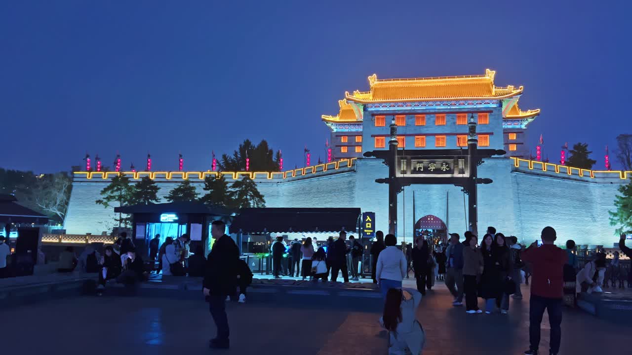 People Enjoying the View and Photographing Yongning Gate in Xi'an, China - Pan Right Shot