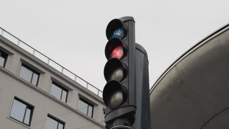 stoplight - traffic light at the road intersection of copenhagen showing stop signal. - low angle