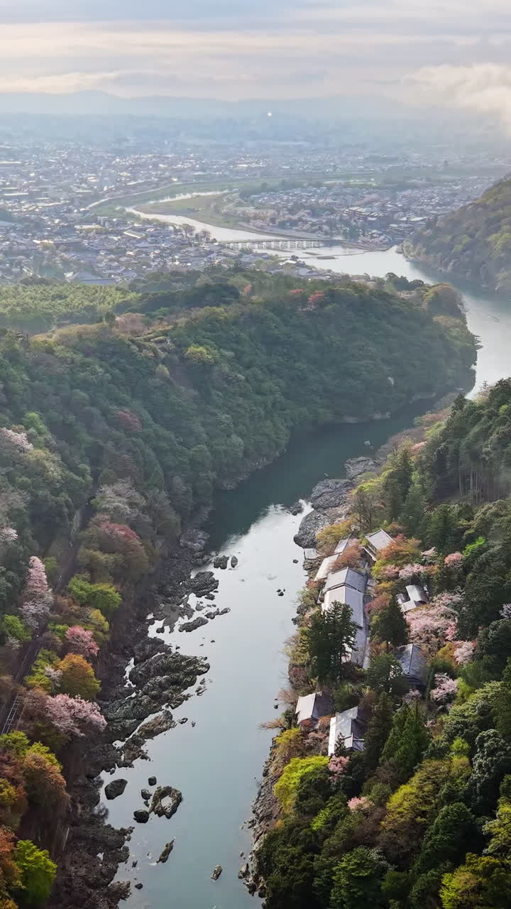 Aerial drone view of the Katsura River in Arashiyama, Japan in daylight