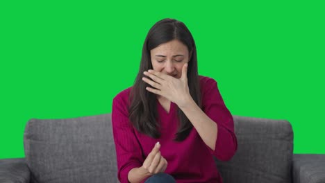 Indian-woman-taking-medicine-in-headache-Green-screen