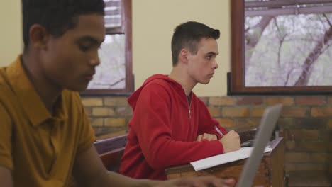 students concentrating in high school class