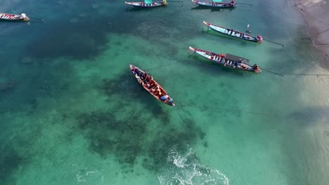 longtail boat turn around with people camera follow from above