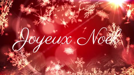 animation of joyeux noel text over snow falling on red background