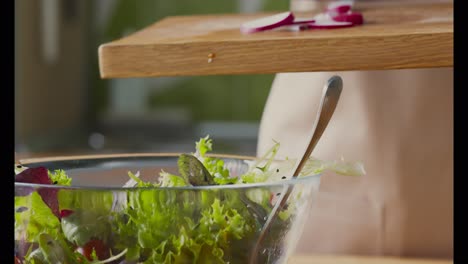 preparing a fresh salad