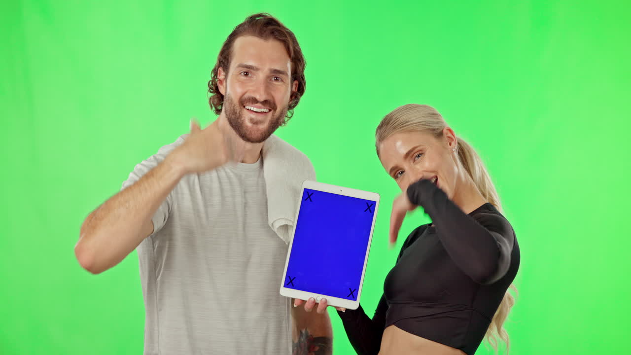 Green screen, thumbs up and people with a tablet