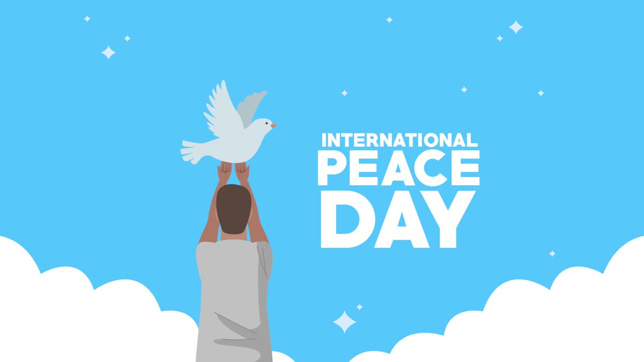 국제 평화의 날 문자: 인간이 비둘기를 들어 올리는 모습