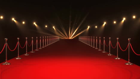 animation of countdown to midnight over red carpet and spots of light on black background