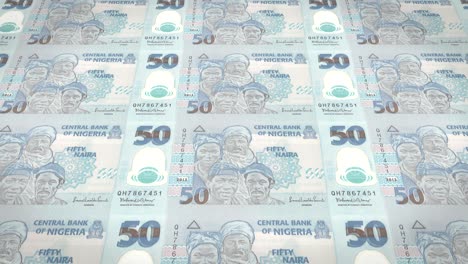 serie de billetes de cincuenta nairas nigerianas del banco central de nigeria rodando en la pantalla, monedas del mundo, dinero en efectivo, bucle