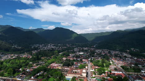 Aerial-View-of-Antigua-Guatemala:-Stunning-Cityscape-and-Volcano-Fuego-from-DJI-air2s-drone