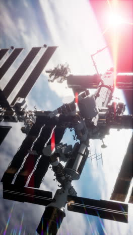 view of the international space station above earth at sunset