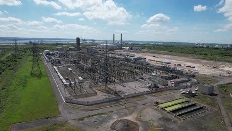 Grain-Electrical-substation-Kent-UK-rising-drone-aerial-view