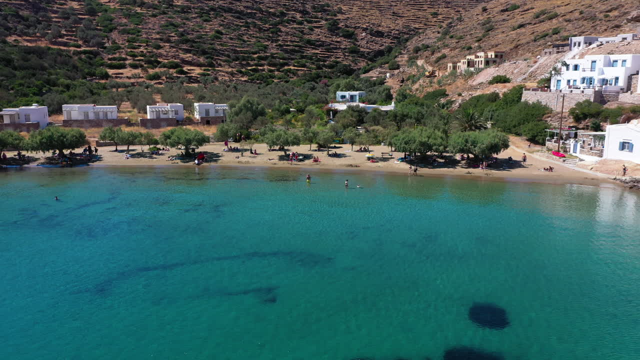Aerial shot of a small Greek island beach. Faros fishing village on the Greek island of Sifnos.