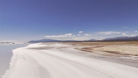 aerial drone push over the salt beaches of salinas grandes of jujuy and salta provinces near capital of salta, argentina