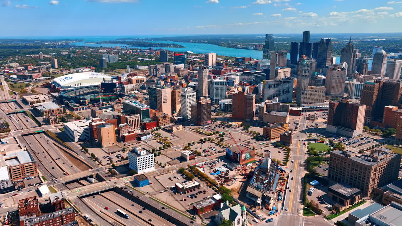 Detroit, USA, 28 July 2025: Detroit freeways leading into downtown. Curving freeways guide traffic into central Detroit with stadiums and skyline filling the view