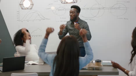 young african american business people celebrating corporate victory happy team leader businessman dancing funny in office presentation successful students meeting seminar