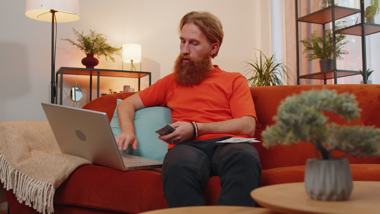 Rich happy man counting money cash and use laptop calculator, calculate domestic income earnings