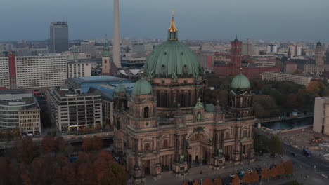 Evening-aerial-view-of-Berliner-Dom,-old-church-and-historic-religious-landmark.-Town-at-dusk.-Berlin,-Germany