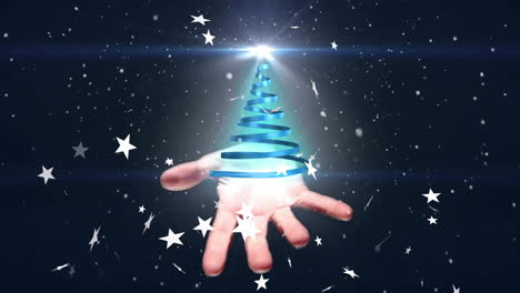 animation of snow and stars over hand holding blue ribbon forming christmas tree on black background