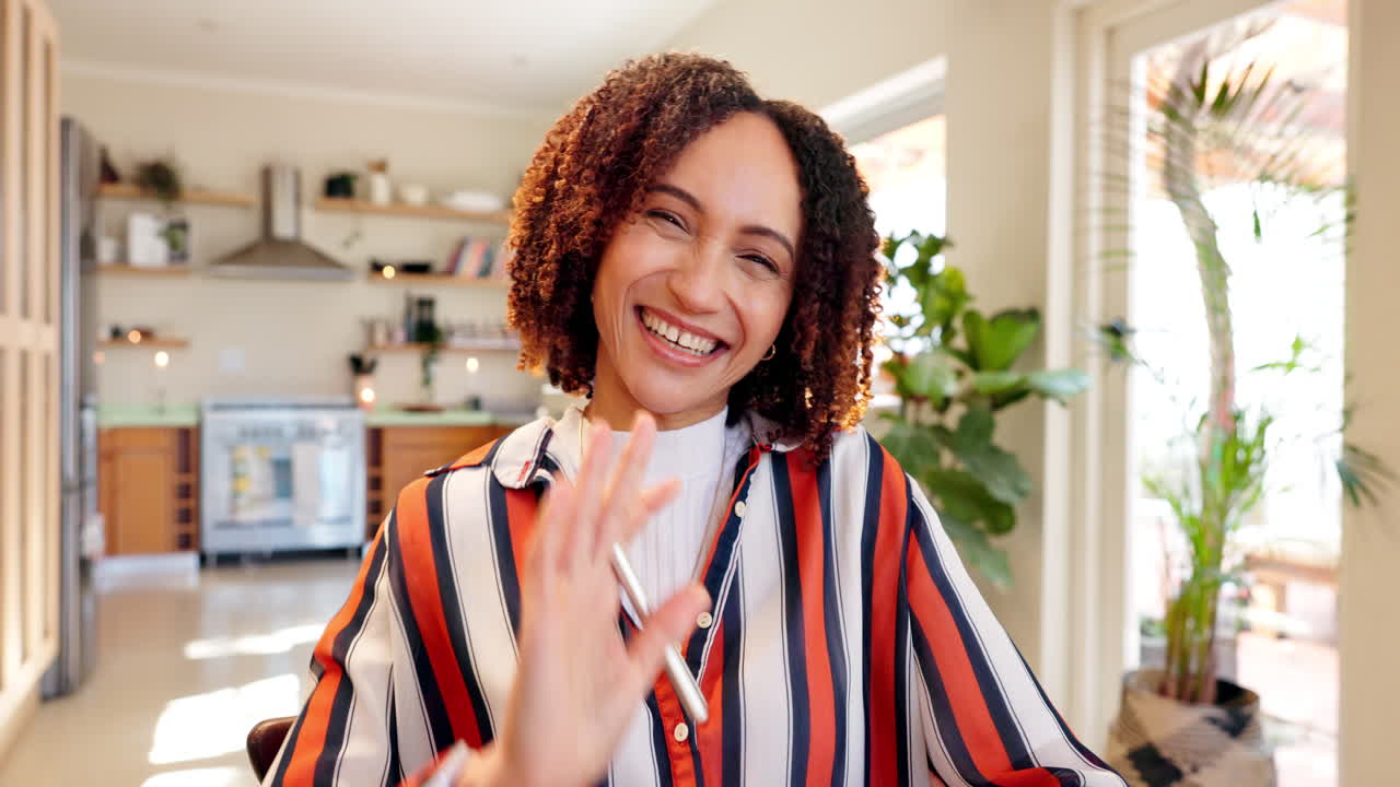 Portrait of a smiling woman in a striped shirt