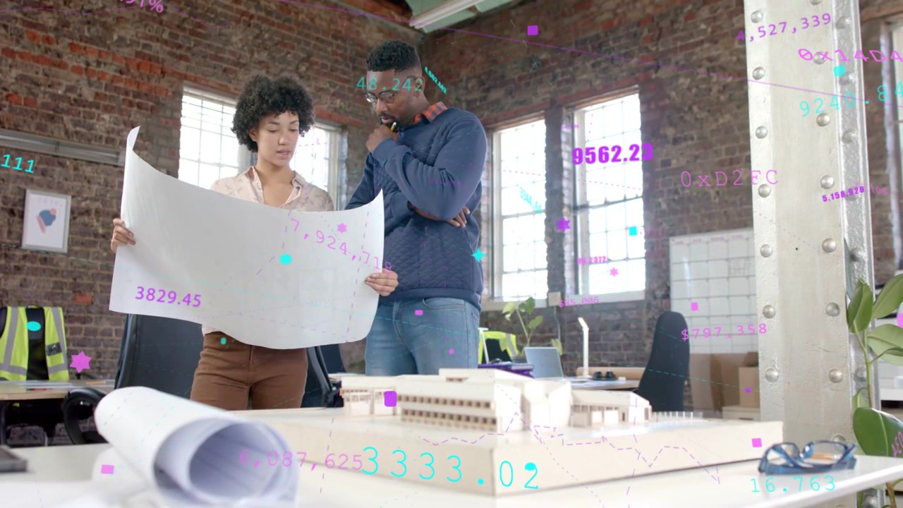 Woman presenting blueprint and man studying model while floating overlays mapping sizes for design