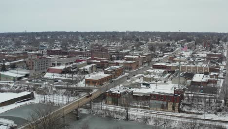 Center-and-main-street-of-small-county-town-with-America-flag-on-tall-pole