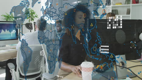 Animation of world map against african american businessman talking on phone headset at office