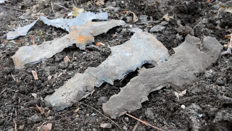 close-up of shrapnel and missile casing debris found in a residential area on the outskirts of kramatorsk, ukraine. this is the evidence of a recent russian strike on the city