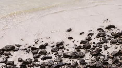 beach with rocks and waves