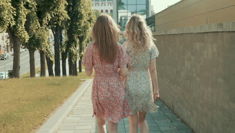 two women walking together