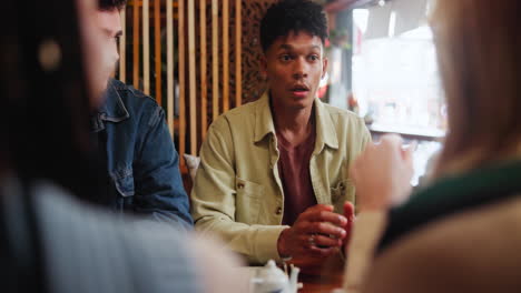 friends chatting over tea
