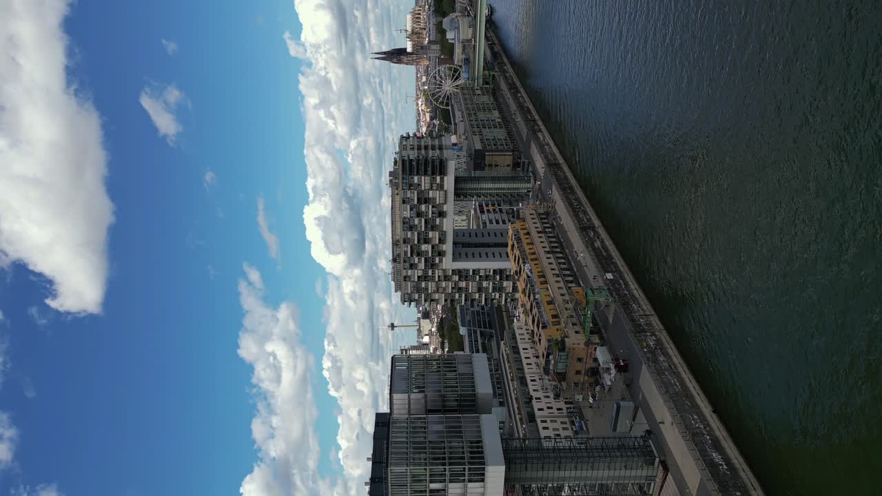 Vertical footage of Kranh&auml;user im Rheinauhafen buildings, bank of the Rhine