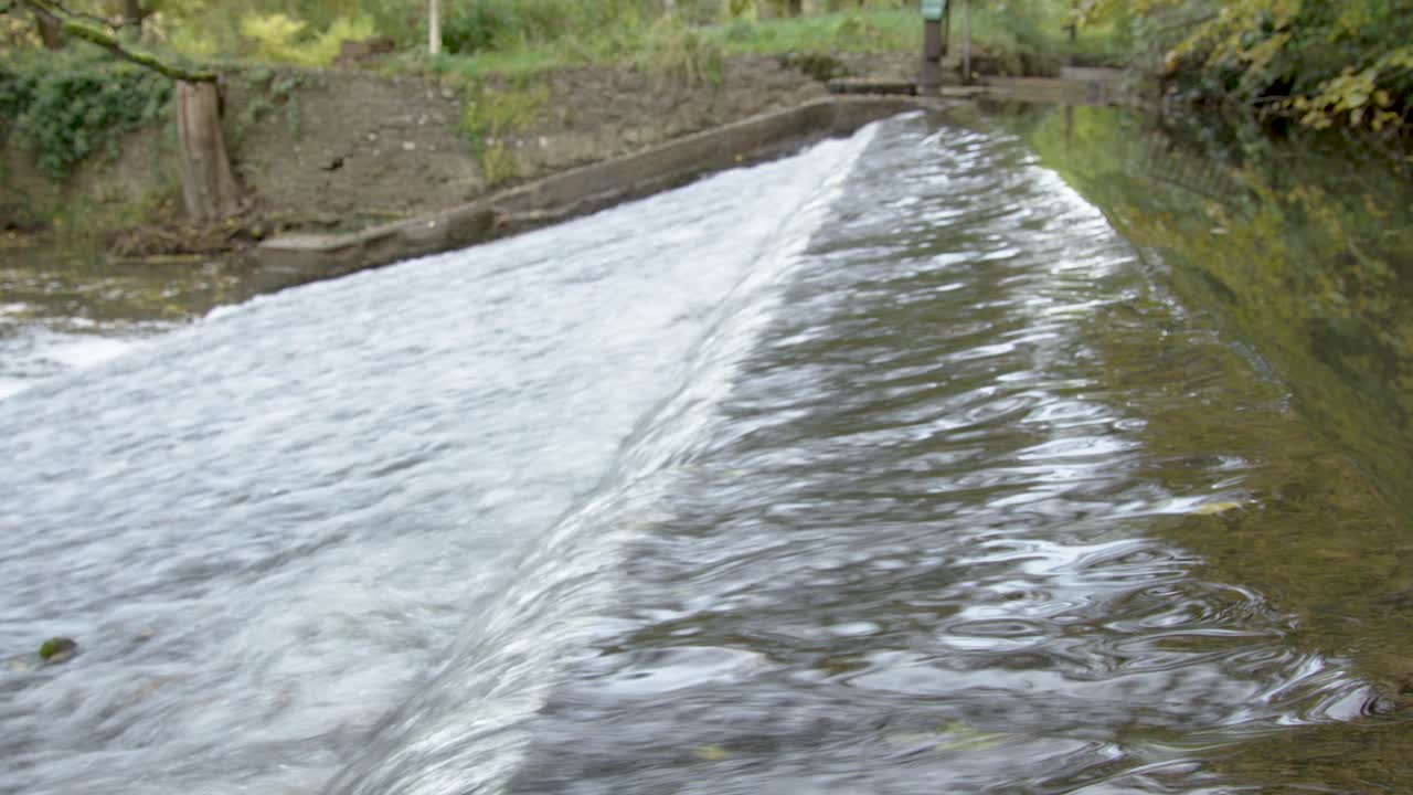 Close up across ridge of the Leigh Brook flowing through the Knapp and Paper-mill Abberley and Malvern Hills Geopark